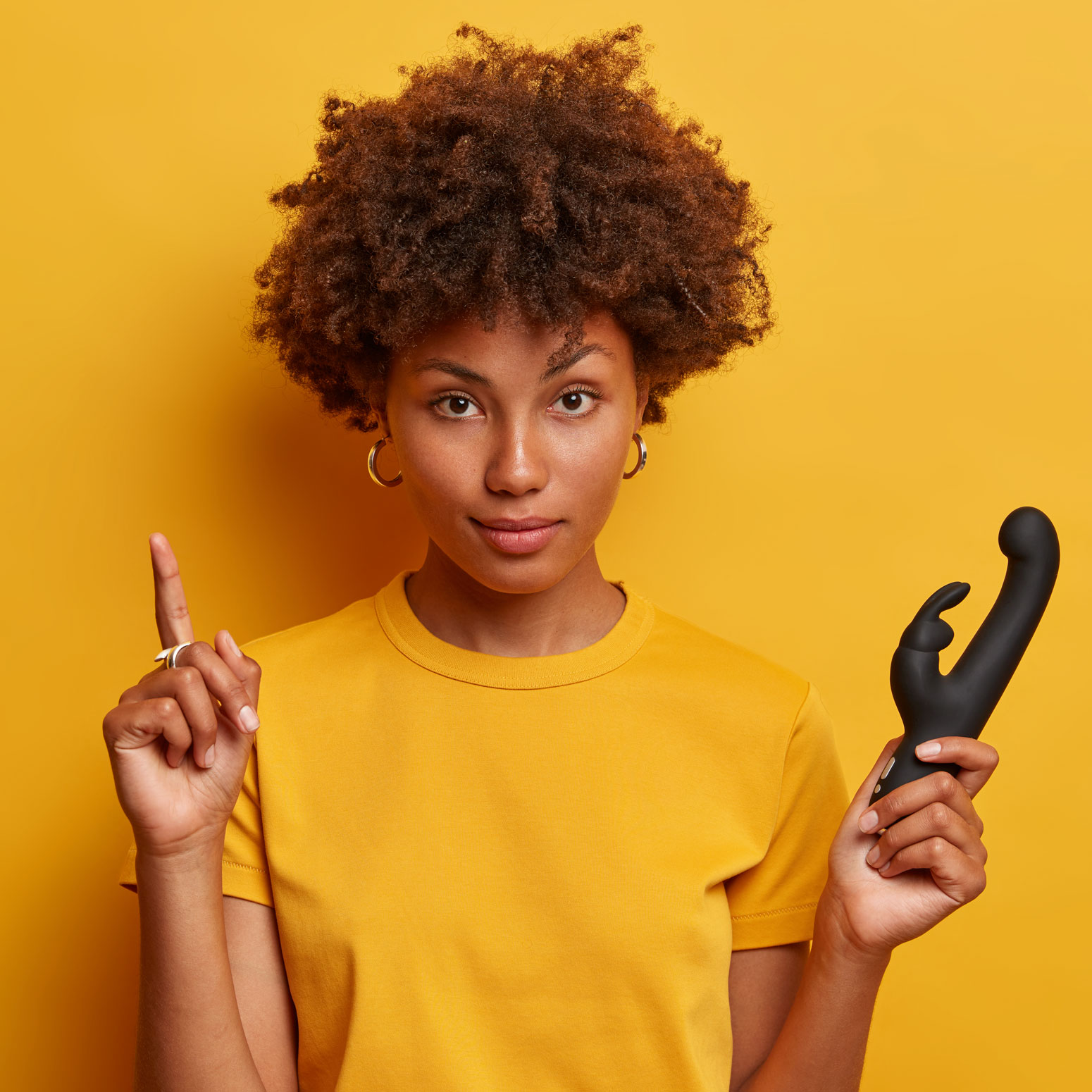 confident-curly-woman-holds-rabbit-vibrator-that-a-2022-02-05-07-41-18-utc.jpg