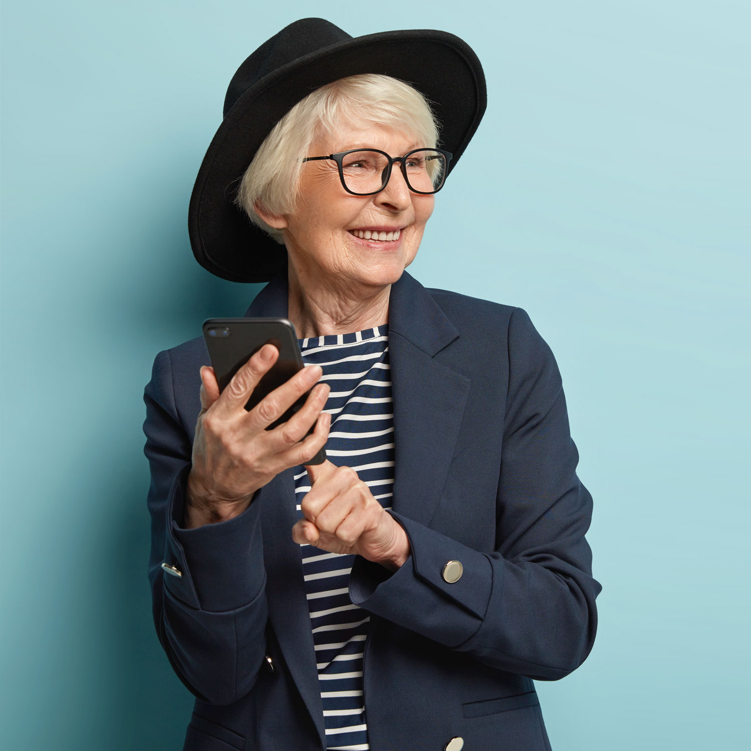 old-attractive-woman-types-text-message-on-cellula-2022-02-08-06-03-56-utc.jpg